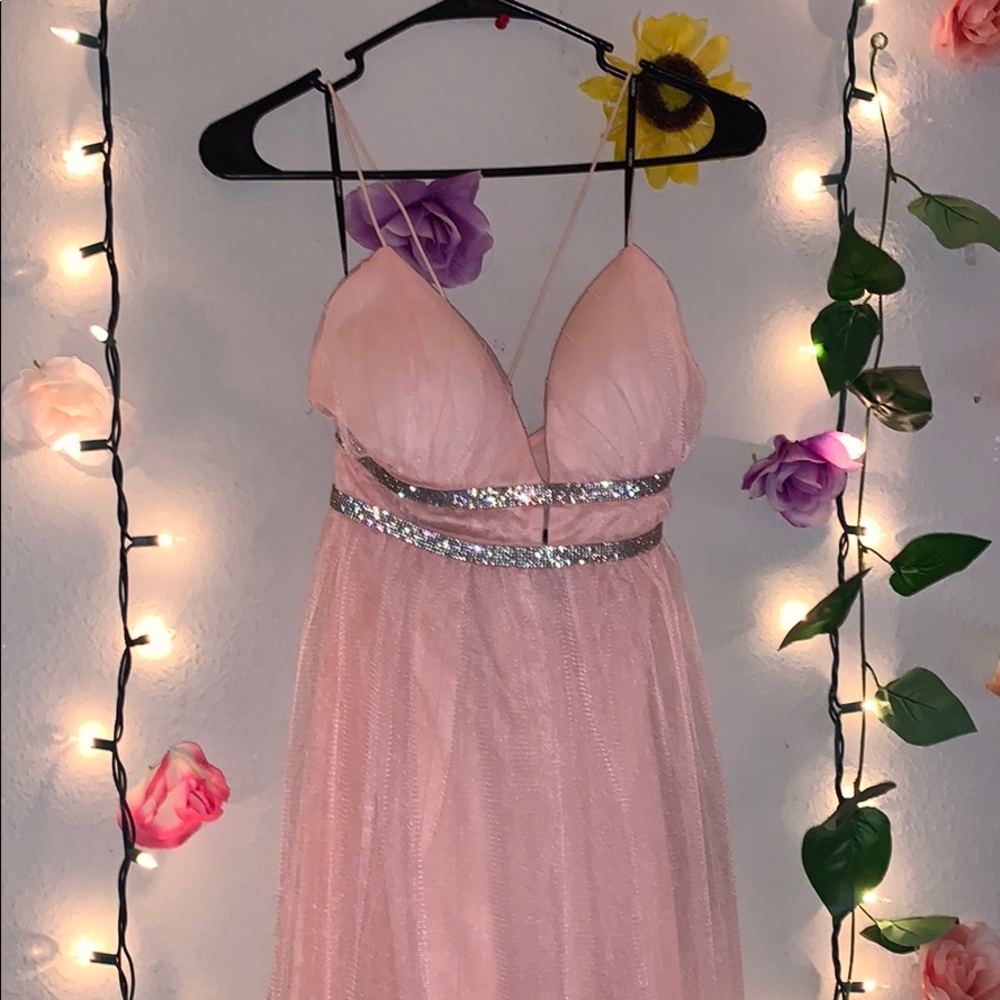 Never worn , pretty light pink prom dress
